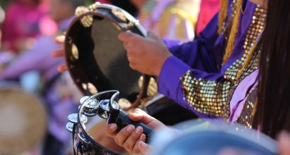 People playing tambourine at the traditional religious festival photo by scopioimages on Envato Elements